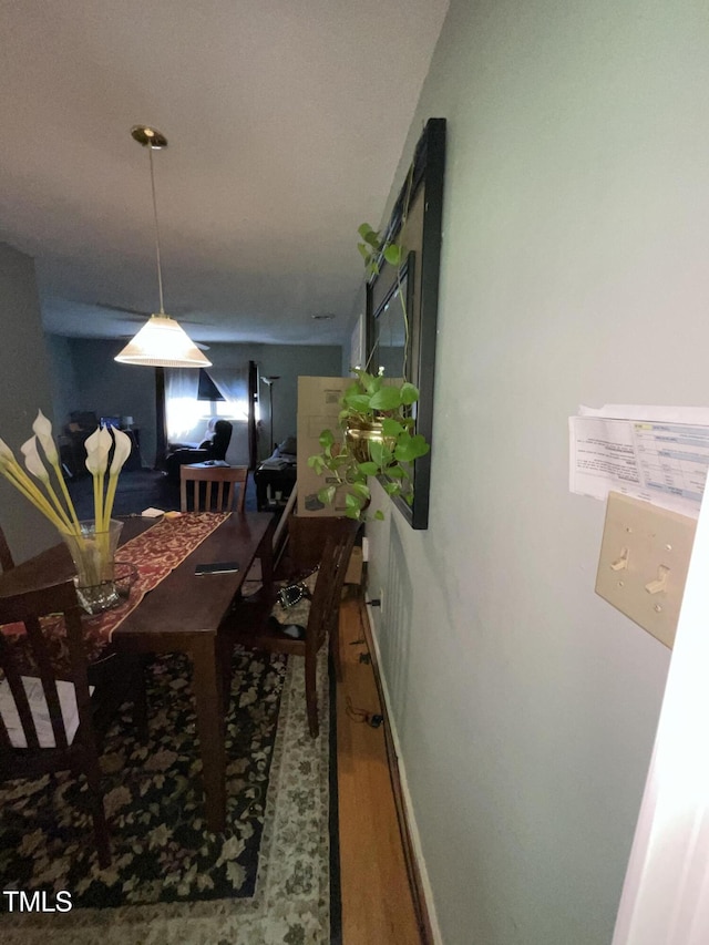 5612 Falls Of Neuse Rd Unit D, Raleigh, NC 27609 - dining space featuring wood finished floors