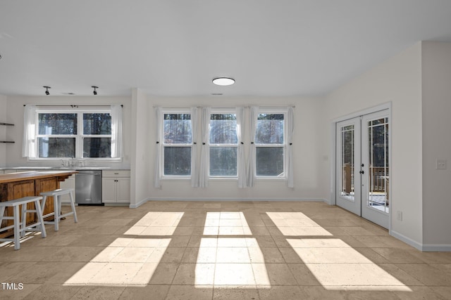 7815 Dodsons Crossroads, Hillsborough, NC 27278 - unfurnished dining area with healthy amount of natural light and french doors
