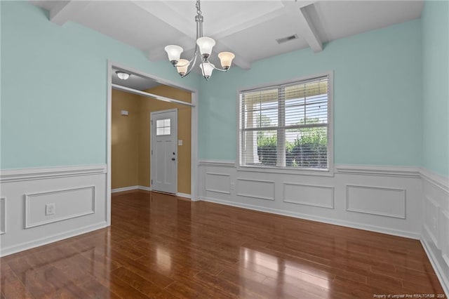 6204 Yorkie Ct, Stedman, NC 28391 - unfurnished dining area with wainscoting, a chandelier, beamed ceiling, and wood finished floors