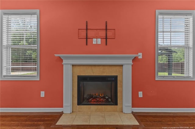 6204 Yorkie Ct, Stedman, NC 28391 - detailed view of wood finished floors and a tiled fireplace