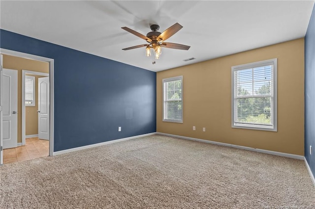 6204 Yorkie Ct, Stedman, NC 28391 - empty room with light colored carpet and a ceiling fan
