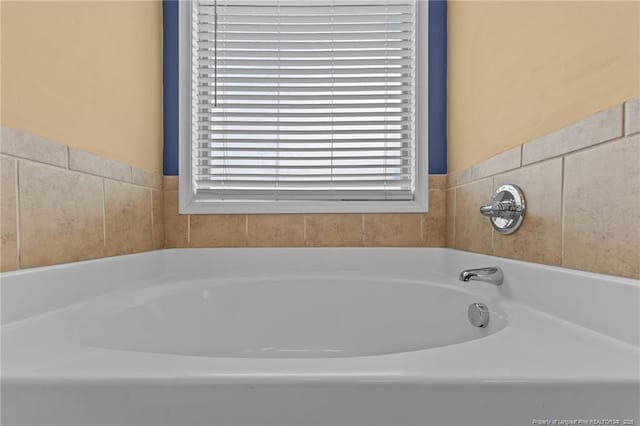 6204 Yorkie Ct, Stedman, NC 28391 - bathroom featuring a garden tub