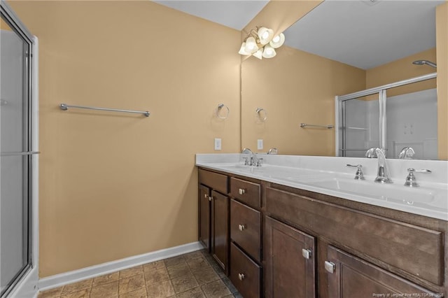 6204 Yorkie Ct, Stedman, NC 28391 - bathroom with double vanity and an enclosed shower