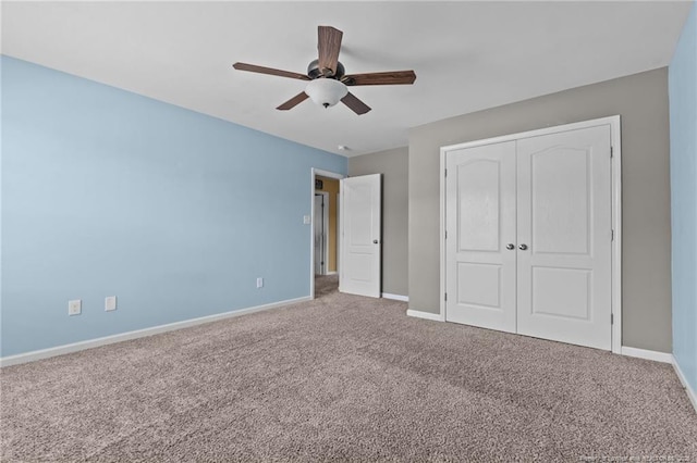 6204 Yorkie Ct, Stedman, NC 28391 - unfurnished bedroom with carpet, a closet, and a ceiling fan