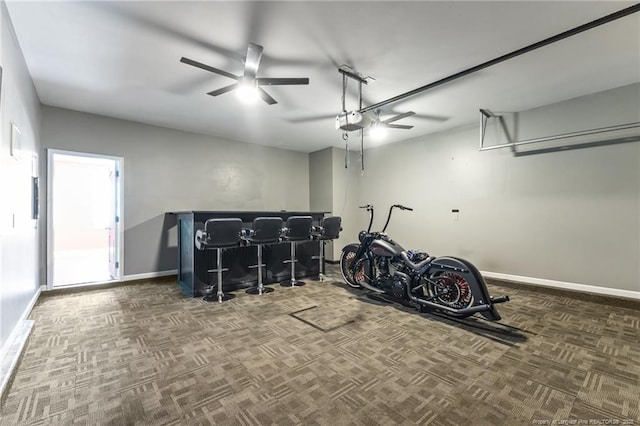 6204 Yorkie Ct, Stedman, NC 28391 - garage with a ceiling fan and a garage door opener