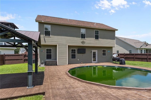 6204 Yorkie Ct, Stedman, NC 28391 - rear view of house with a gazebo, a fenced backyard, and a patio