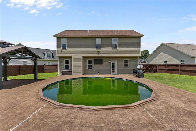 6204 Yorkie Ct, Stedman, NC 28391 - back of property with a gazebo and a fenced backyard