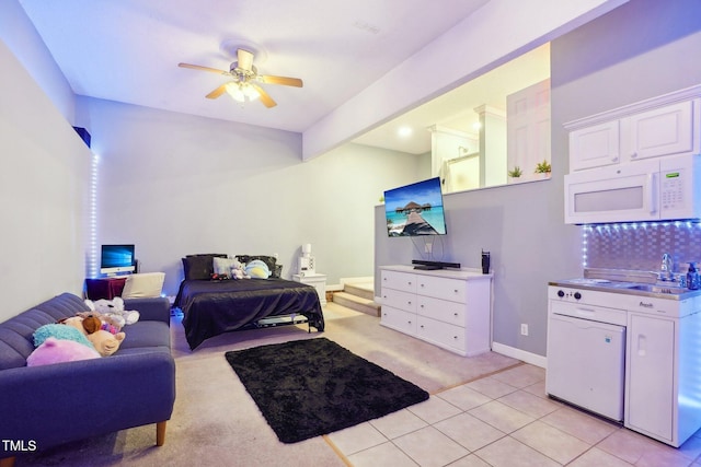 683 Castleberry Rd, Clayton, NC 27527 - bedroom featuring light carpet, light tile patterned flooring, and a ceiling fan
