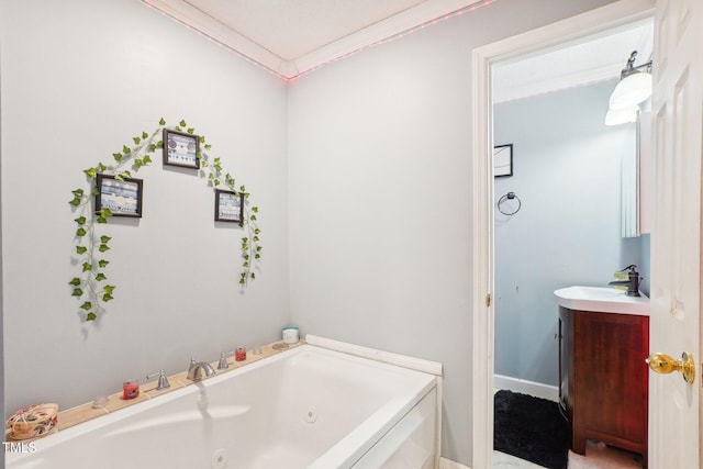 683 Castleberry Rd, Clayton, NC 27527 - bathroom featuring a jetted tub, vanity, and crown molding