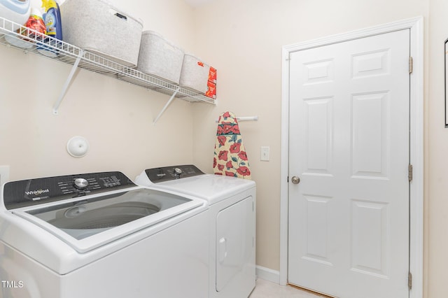 5030 Homeplace Dr, Apex, NC 27539 - washroom with washer and dryer and baseboards