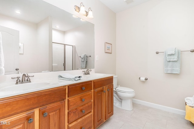 5030 Homeplace Dr, Apex, NC 27539 - bathroom featuring a shower stall, double vanity, tile patterned flooring, and recessed lighting