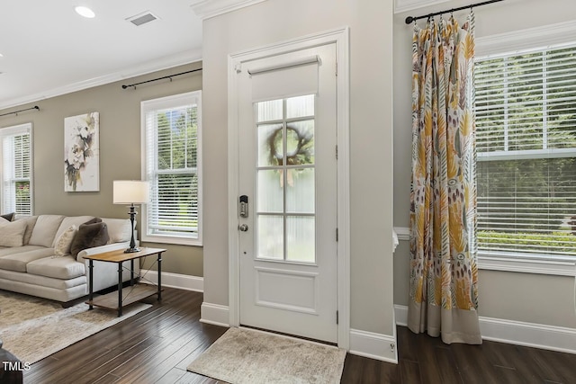 669 Fallon Grove Way, Raleigh, NC 27608 - entrance foyer featuring ornamental molding, dark wood-type flooring, plenty of natural light, and recessed lighting