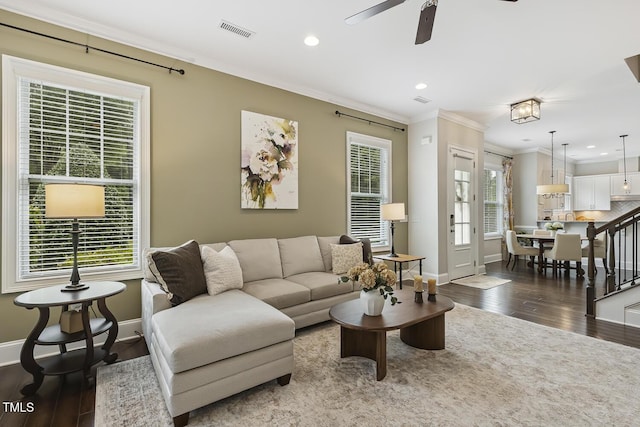 669 Fallon Grove Way, Raleigh, NC 27608 - living area featuring dark wood-type flooring, ceiling fan, crown molding, and recessed lighting