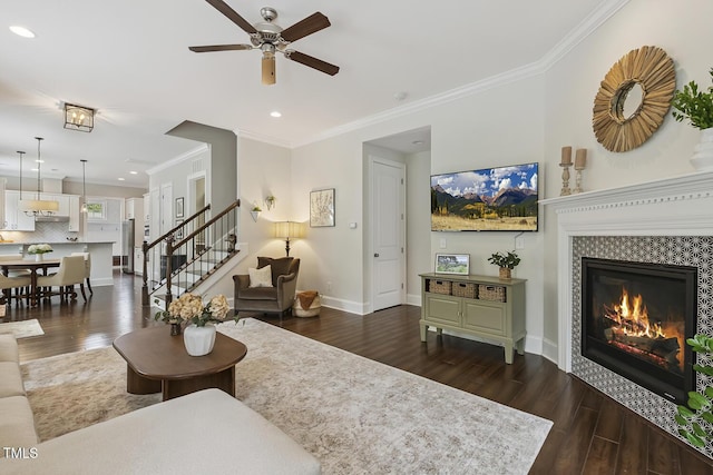 669 Fallon Grove Way, Raleigh, NC 27608 - living area with dark wood-type flooring, recessed lighting, ornamental molding, stairway, and a ceiling fan