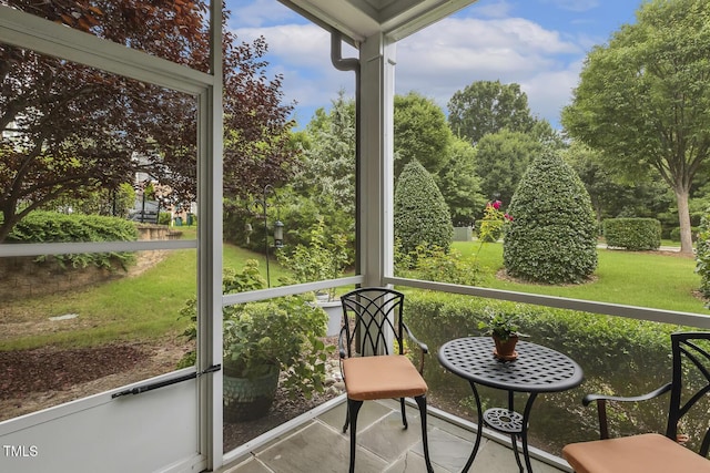 669 Fallon Grove Way, Raleigh, NC 27608 - sunroom / solarium featuring view of scattered trees