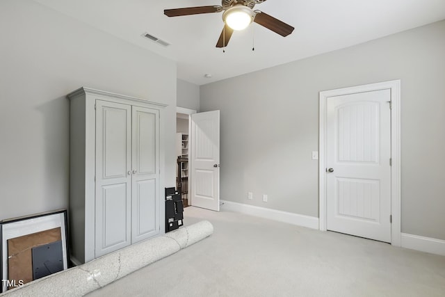 669 Fallon Grove Way, Raleigh, NC 27608 - unfurnished bedroom featuring light colored carpet and ceiling fan