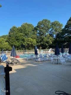 8331 Wycombe Ln, Raleigh, NC 27615 - community pool with a patio