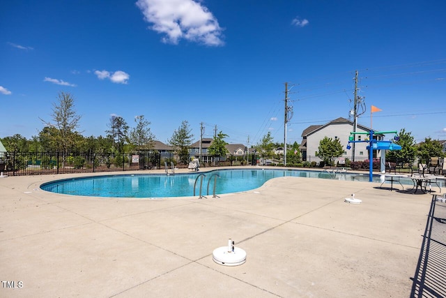 1869 Blue Jay Pt, Apex, NC 27502 - community pool featuring a patio area