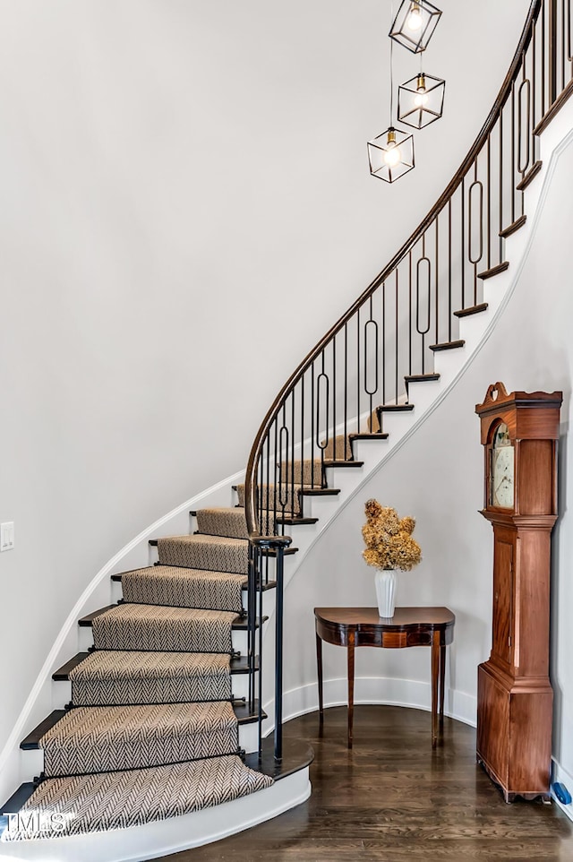 5040 Shakori Trl, Durham, NC 27707 - stairway with wood finished floors and baseboards