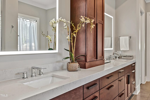 5040 Shakori Trl, Durham, NC 27707 - bathroom featuring double vanity and tile patterned floors