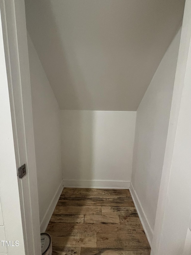 1119 Sagamore Dr, Louisburg, NC 27549 - bonus room with vaulted ceiling and hardwood / wood-style floors