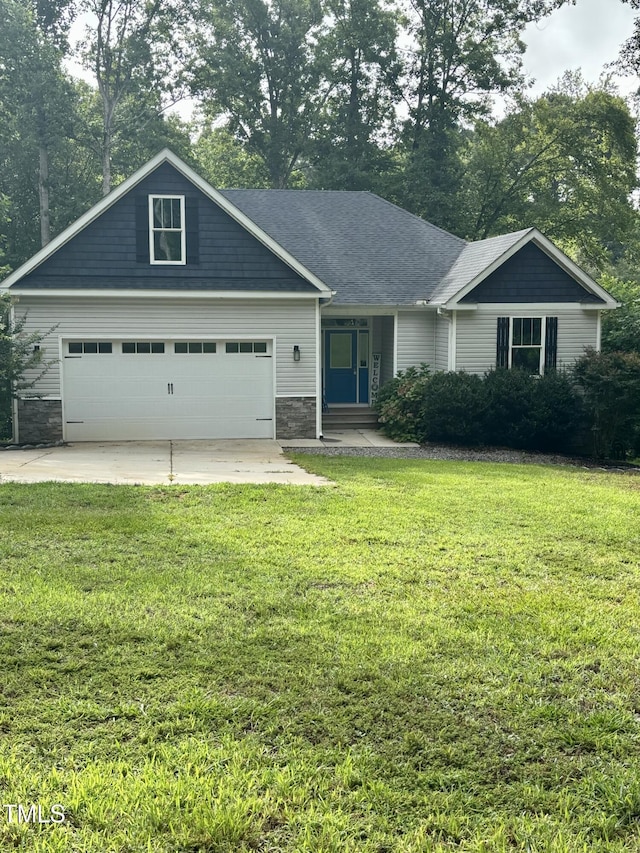 1119 Sagamore Dr, Louisburg, NC 27549 - craftsman inspired home featuring stone siding, a front yard, and concrete driveway
