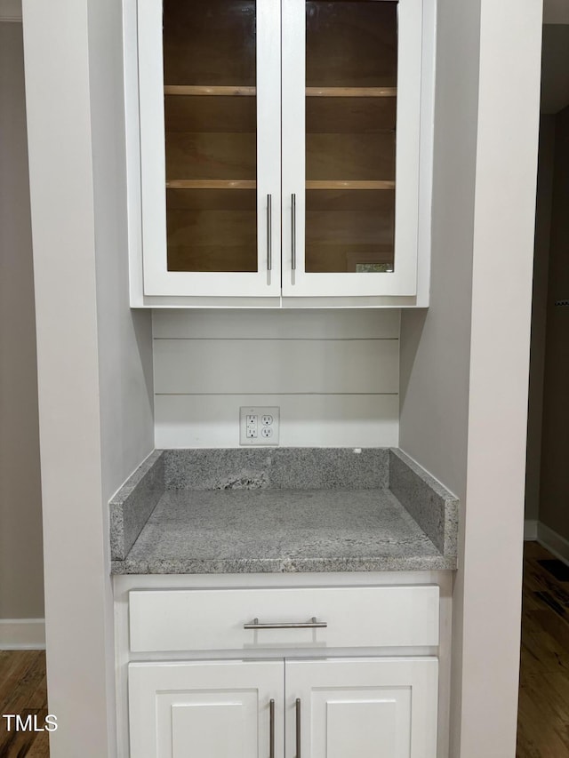1119 Sagamore Dr, Louisburg, NC 27549 - detailed view of wood finished floors and baseboards