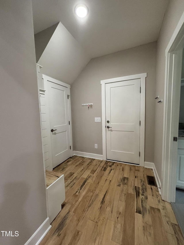 1119 Sagamore Dr, Louisburg, NC 27549 - entryway with light wood-style flooring and lofted ceiling