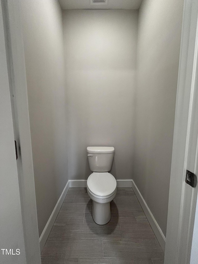 1119 Sagamore Dr, Louisburg, NC 27549 - bathroom with wood finished floors