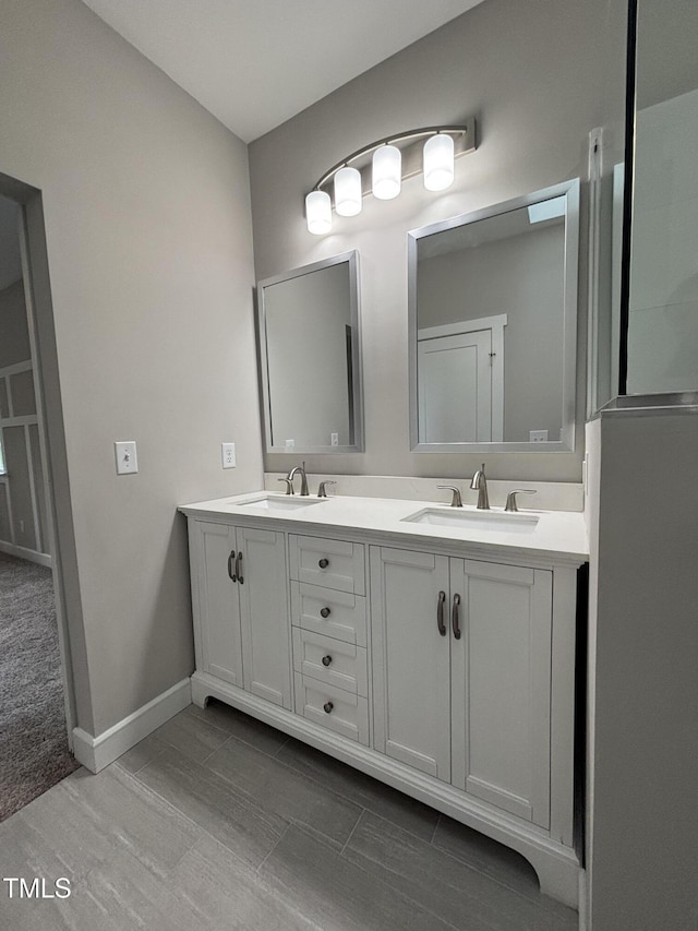 1119 Sagamore Dr, Louisburg, NC 27549 - full bathroom featuring double vanity and baseboards
