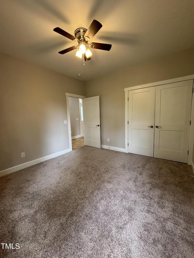 1119 Sagamore Dr, Louisburg, NC 27549 - unfurnished bedroom with carpet flooring, a closet, and ceiling fan