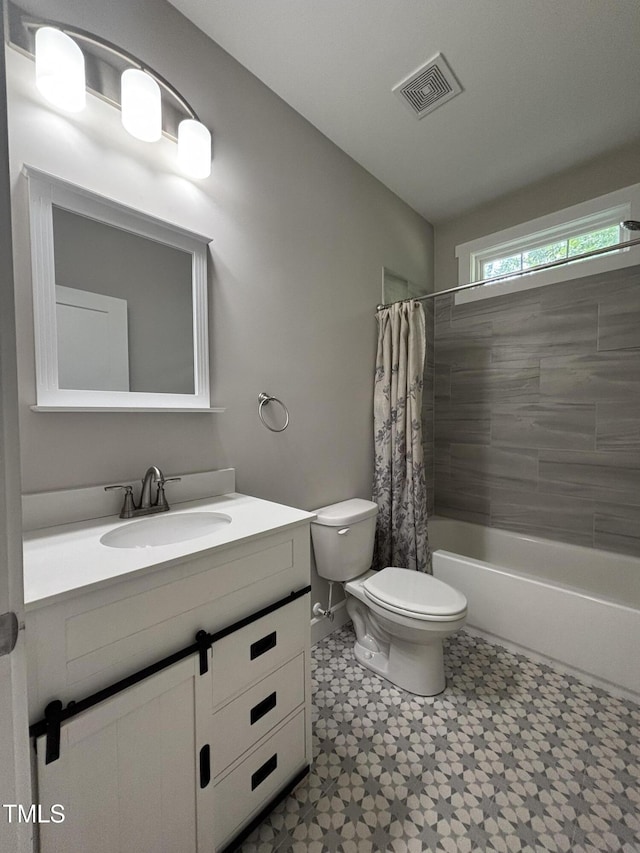 1119 Sagamore Dr, Louisburg, NC 27549 - full bathroom with vanity, shower / bath combo, and tile patterned floors