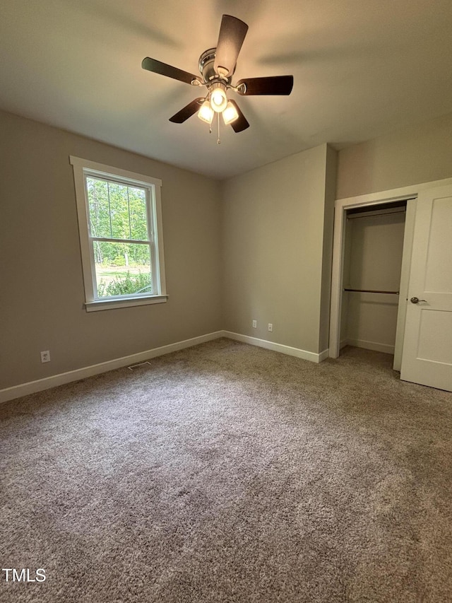 1119 Sagamore Dr, Louisburg, NC 27549 - unfurnished bedroom featuring carpet floors, a closet, and ceiling fan