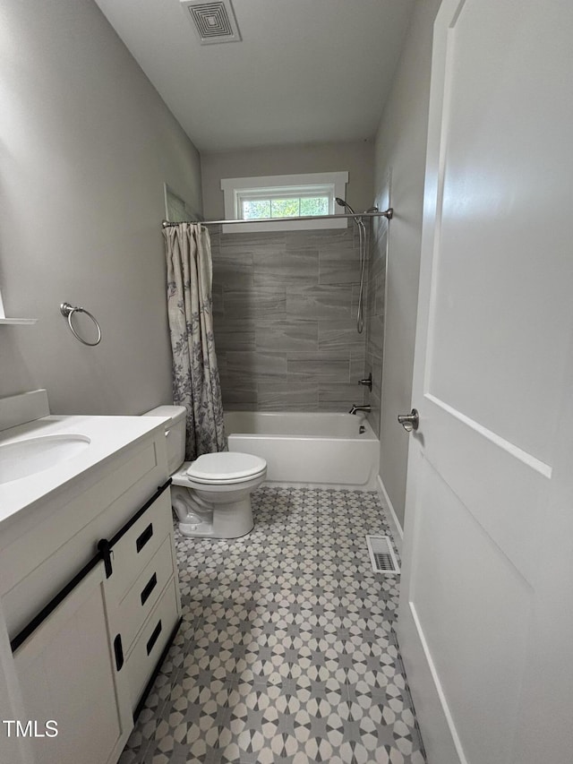 1119 Sagamore Dr, Louisburg, NC 27549 - bathroom featuring vanity and shower / tub combo with curtain