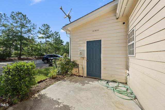 241 Commons Dr, Holly Springs, NC 27540 - entrance to property with a patio