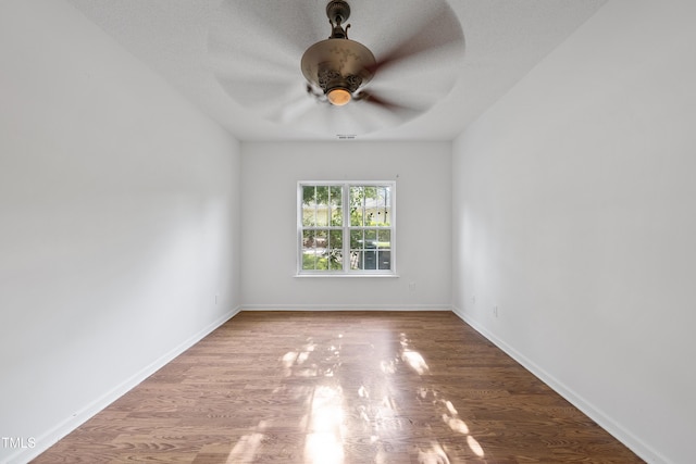 241 Commons Dr, Holly Springs, NC 27540 - spare room with ceiling fan and wood finished floors