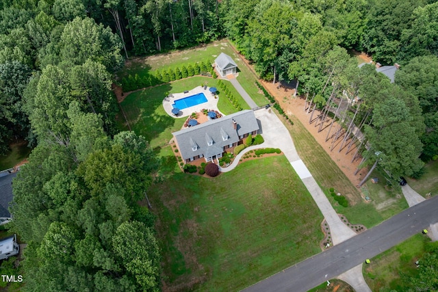 4135 Somerset Dr, Oxford, NC 27565 - aerial view of property's location with a pool area and a heavily wooded area