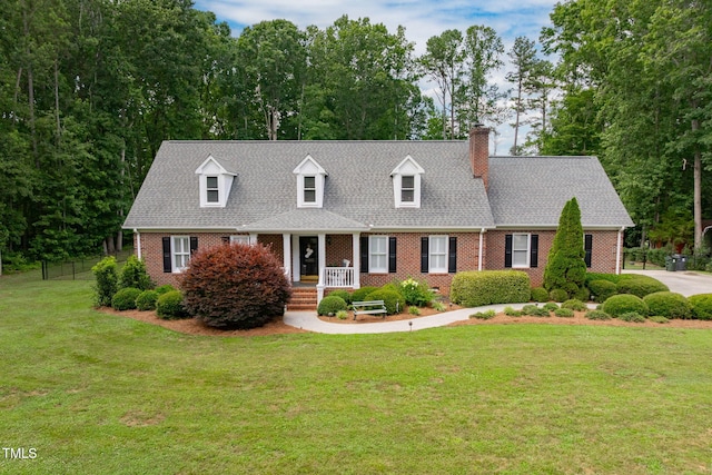 4135 Somerset Dr, Oxford, NC 27565 - new england style home featuring brick siding, a chimney, and a shingled roof