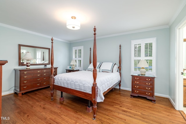4135 Somerset Dr, Oxford, NC 27565 - bedroom featuring crown molding, light wood-type flooring, and multiple windows