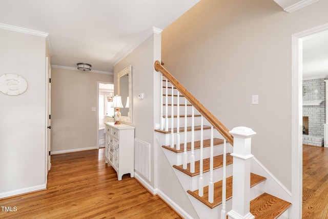 4135 Somerset Dr, Oxford, NC 27565 - stairs with wood finished floors and ornamental molding