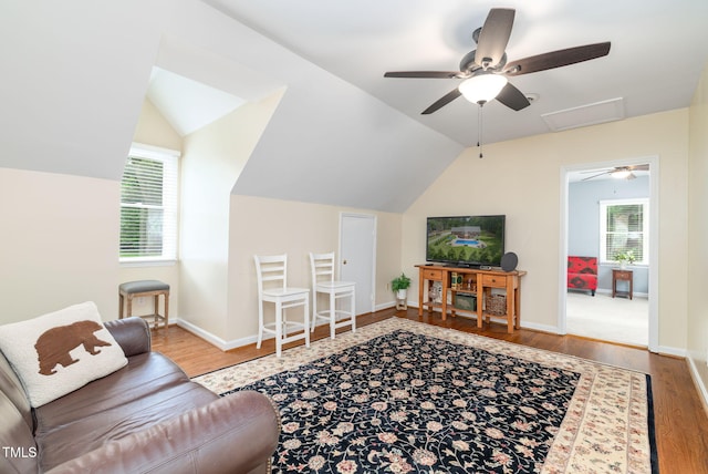 4135 Somerset Dr, Oxford, NC 27565 - living room with wood finished floors, lofted ceiling, attic access, and ceiling fan