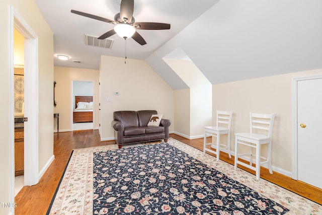 4135 Somerset Dr, Oxford, NC 27565 - living area with wood finished floors, ceiling fan, and vaulted ceiling