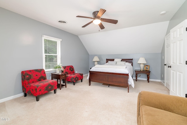 4135 Somerset Dr, Oxford, NC 27565 - bedroom with lofted ceiling, light colored carpet, and a ceiling fan
