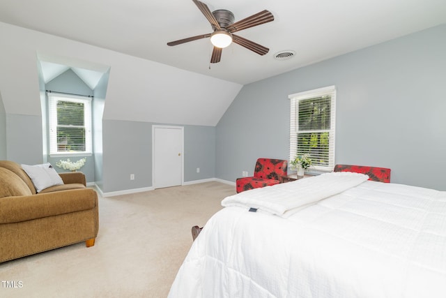 4135 Somerset Dr, Oxford, NC 27565 - bedroom featuring light colored carpet, vaulted ceiling, and a ceiling fan