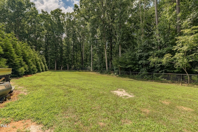 4135 Somerset Dr, Oxford, NC 27565 - view of yard with a forest view