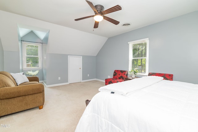 4135 Somerset Dr, Oxford, NC 27565 - bedroom with light carpet, vaulted ceiling, multiple windows, and a ceiling fan