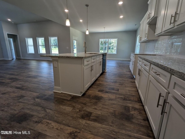 5677 Red Oak Battleboro Rd Lot 3, Battleboro, NC 27809 - kitchen with open floor plan, dark wood-type flooring, a kitchen island with sink, white cabinets, and recessed lighting