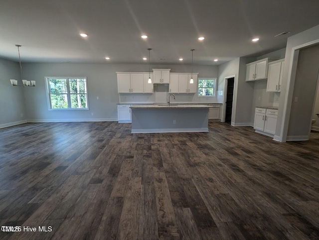 5677 Red Oak Battleboro Rd Lot 3, Battleboro, NC 27809 - kitchen with a center island with sink, open floor plan, dark wood-style floors, a chandelier, and white cabinetry