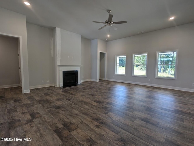 5677 Red Oak Battleboro Rd Lot 3, Battleboro, NC 27809 - unfurnished living room with dark wood-style flooring, ceiling fan, a fireplace with flush hearth, and recessed lighting