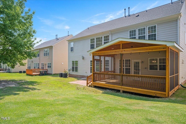 2021 Patapsco Dr, Apex, NC 27523 - back of property featuring a deck and a lawn
